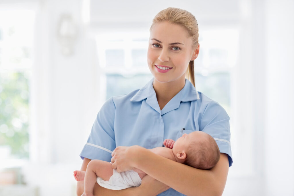 Professional Night Nurse providing physician-led overnight newborn care while a newborn sleeps peacefully in a safe nursery environment.